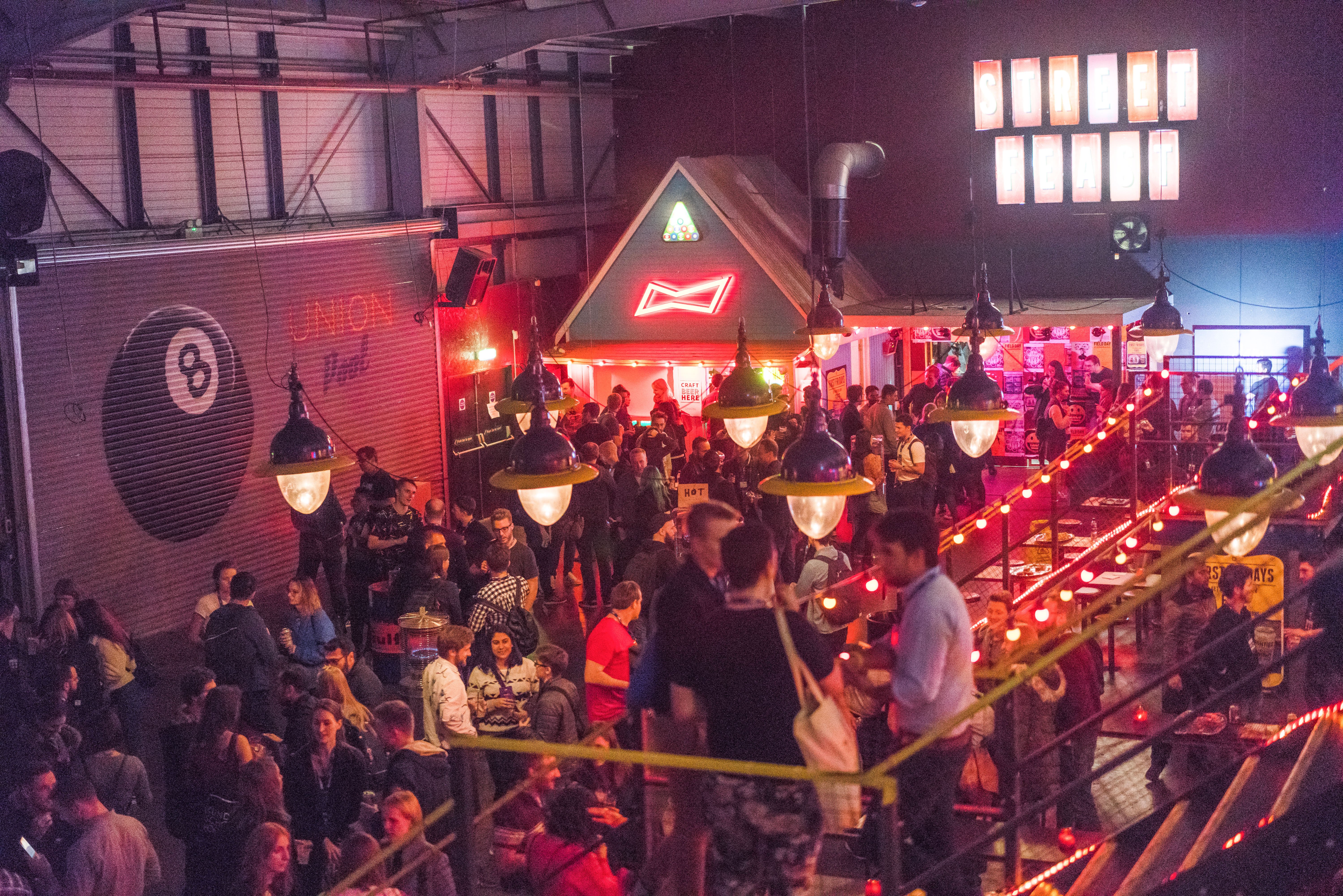 eveining-inside-warehouse-attendees-of-jam-conference-gather